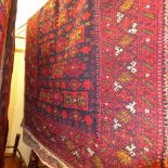 A fine North East Persian Meshad Belouch rug, 177cm x 125cm, repeating stylised geometrical motifs
