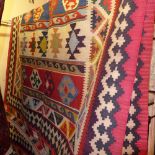 A fine South West Persian Qashgai Kilim 295cm, x 185cm, repeating pole medallion within stylised