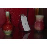 Three Chinese high fired green and red glazed vases