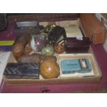 A large collection of various items including a Bakelite writing pad a Minox Spy camera, lighters,