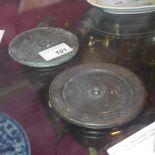 Two Tang dynasty Chinese bronze circular hand mirrors, one with maker's stamp