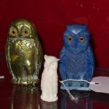 A French blue Bakelite Boujalais scent bottle in the form of an owl, together with a carved bone