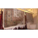 Two Persian hand knotted rugs of small size