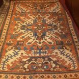 A Persian hand knotted Kelim carpet the red field with geometric floral pattern in a triple border