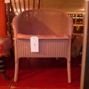 A Lloyd Loom wicker bedroom chair