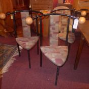 A set of six mid C20th painted metal designer chairs with geometric fabric upholstered seats