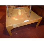 A birch ply low table with a frosted glass insert