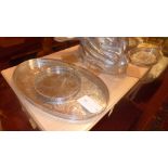 A large oval silver plated viner's tray together with a matching circular tray and three other