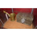 A Chinese white metal casket and a bronze pestle and morter