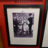 A framed photo of Alex James holding the FA Cup for Arsenal 1936