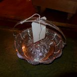 A William Hutton and Sons silver plated fruit basket with a swing handle