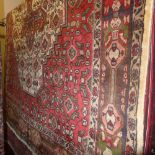 A North West Persian Bidjar carpet 250 cm x 150cm, central floral medallion on an ivory field,