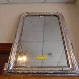 A C19th French pier mirror the arched plate within moulded silvered frame with beaded detail