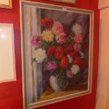 An oil on canvas still life study of chrysanthemums in a painted frame signed N Piccot 1941