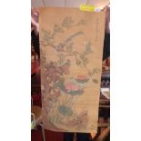 A Chinese hand painted scroll decorated with exotic birds on branches with lotus flowers