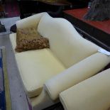 A Chippendale design camel back sofa uph