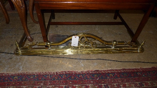 An Art Nouveau brass fender and three Ri