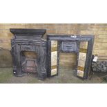 A Victorian tiled back cast iron fire insert and a similar