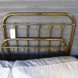 A Victorian brass single bedstead with s