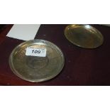 A pair of silver plated Chinese style coin dishes