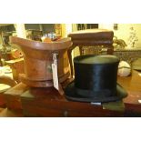 A c19th top hat in original leather case