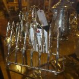 A pair of silver plated novelty toast racks