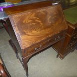 A walnut inlaid bureau with hinged front over single drawer and fitted interior