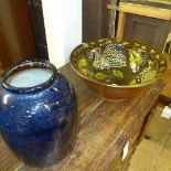 A blue glazed vase and a brown glazed la