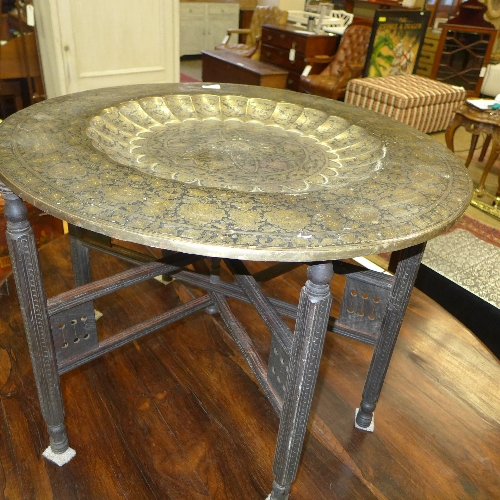 A 'Banners' brass tray on folding stand