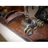A C19th leather gun case and a pair of l
