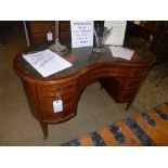 A Sheraton revival mahogany and satinwood inlaid Kidney shaped writing desk the leather top above