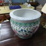 A Chinese porcelain jardiniere/fish bowl and a porcelain jardiniere stand