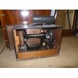 A Singer sewing machine in original case