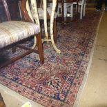 A hand knotted Persian carpet the beige