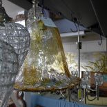 An amber colour Murano glass ceiling shade