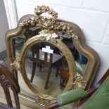 A gilted segmented wall hanging mirror