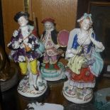 A pair of C19th continental porcelain figures in traditional costume