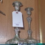 A pair of silver plated candlesticks