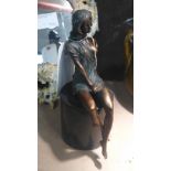 A bronze nude female on a marble base