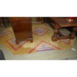 A contemporary hand knotted rug the rust ground with stylized decoration