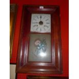 A stained pine Ansonia clock with painte