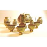 A collection of Cairoware, to include a brass bowl decorated with calligraphic and arabesque panels,