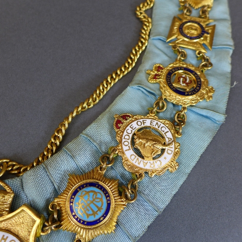 A Masonic chain of office, the sky blue ribbon with various gilt metal and enamel jewels. - Image 3 of 4