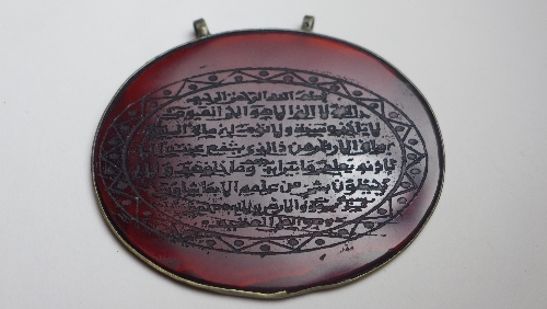 Two C19th Islamic agate pendants, with Koranic verse within white metal mount, the largest 7.5 cm x - Image 3 of 4