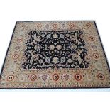 A hand woven Afghani carpet the black ground with overall design of palmettes, flowerheads and