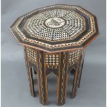 A large Persian decagonal parquetry wooden table, C19th, the legs in the form of Mihrab arches,