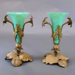 A pair of Art Nouveau spill vases, having trumpet form jade opaque glass inners within a cast lily