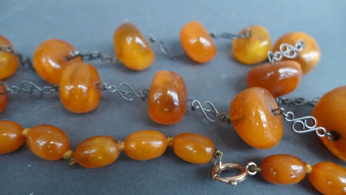 Two strings of semi-translucent butterscotch amber beads, early C20th, one with graduated beads - Image 3 of 3