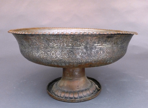 A very large Persian Safavid tinned copper bowl, C18th, the circular bowl with repeating floral