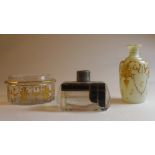 An Art Deco glass perfume bottle with overlaid decoration (lacking stopper) and two gilt decorated